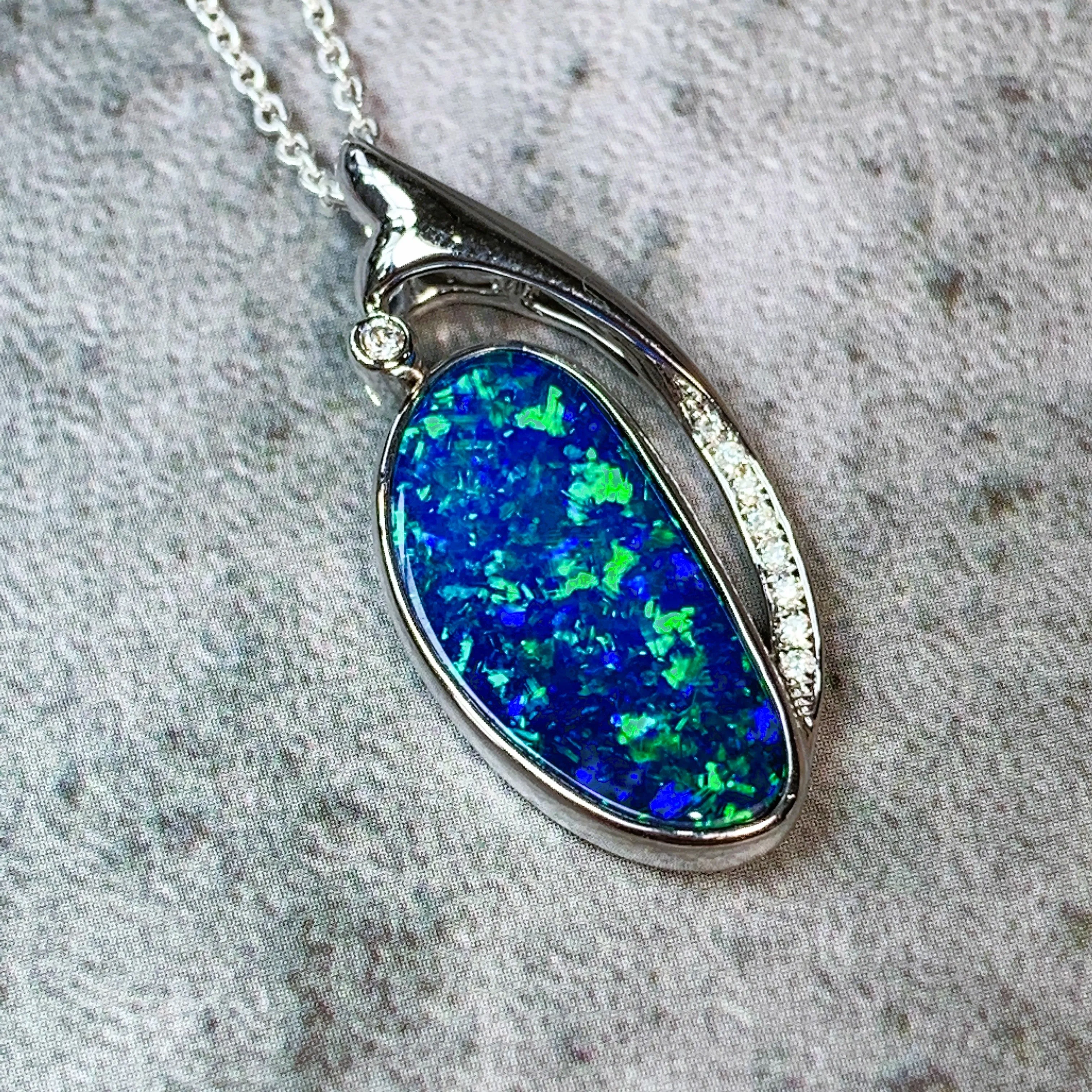 14kt White Gold 4ct Opal and Diamond pendant