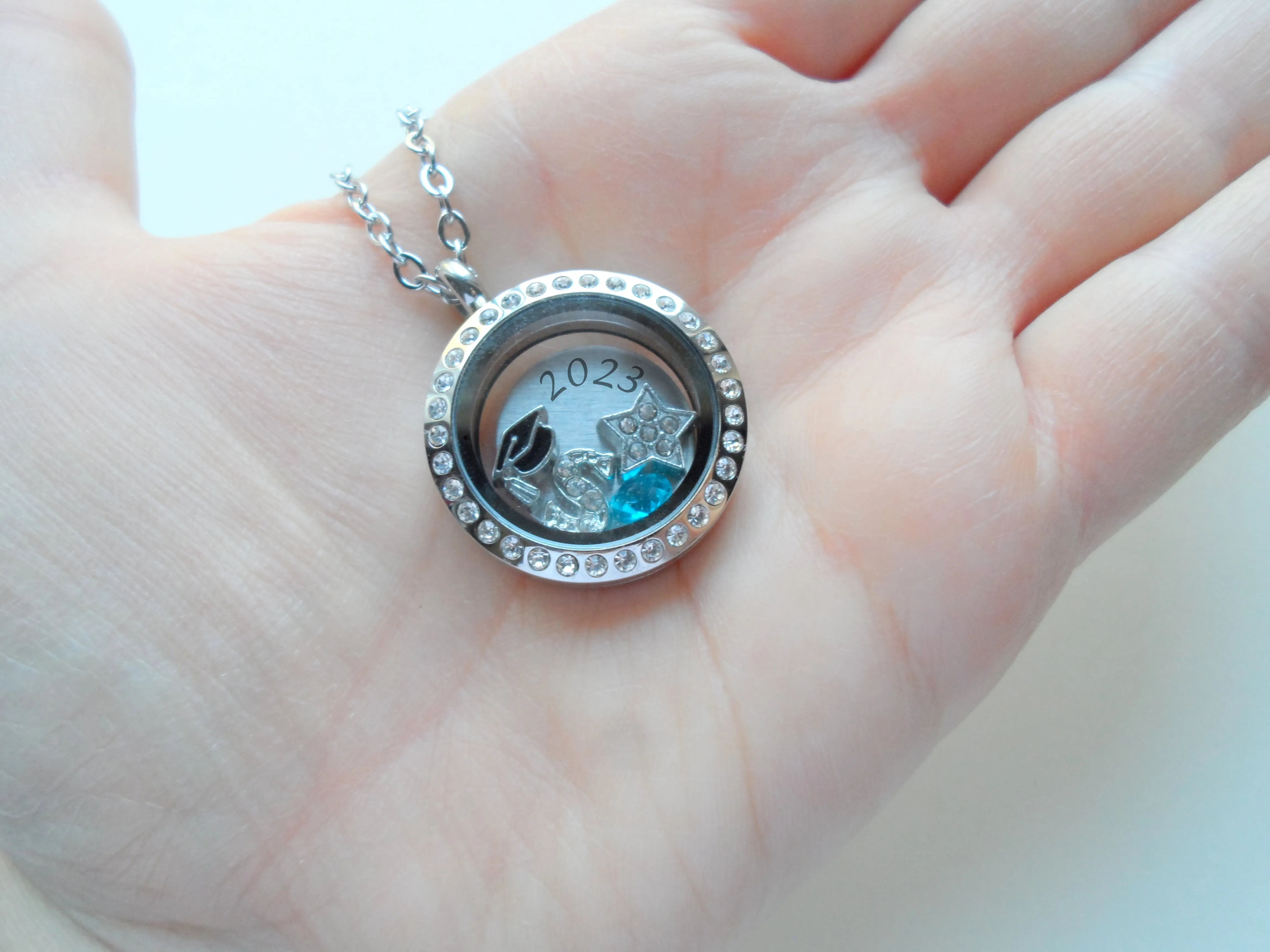 Class of 2025 Graduate Locket Necklace with Graduate Cap, 2025 Disc, and Custom Letter & Birthstone - by Jewelry Everyday