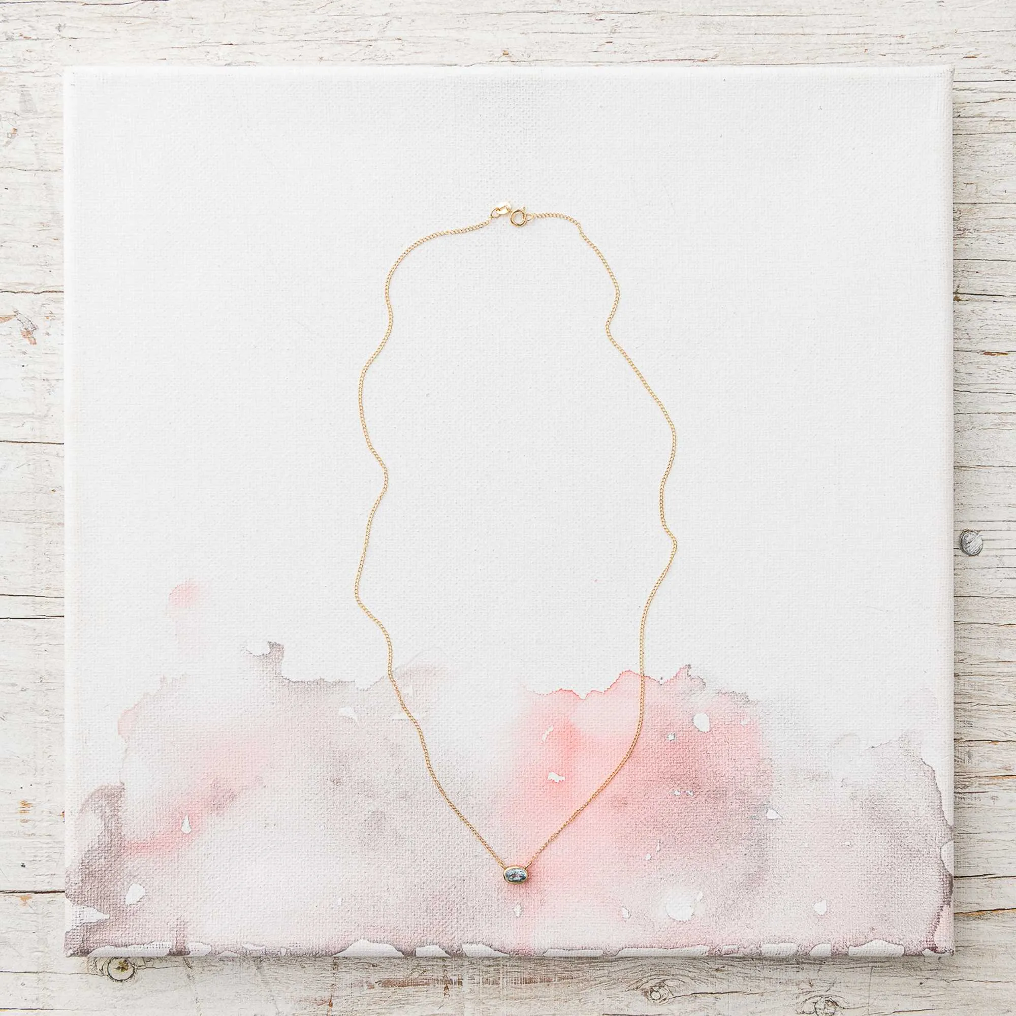 East-West Sky Blue Topaz Necklace in 14k gold
