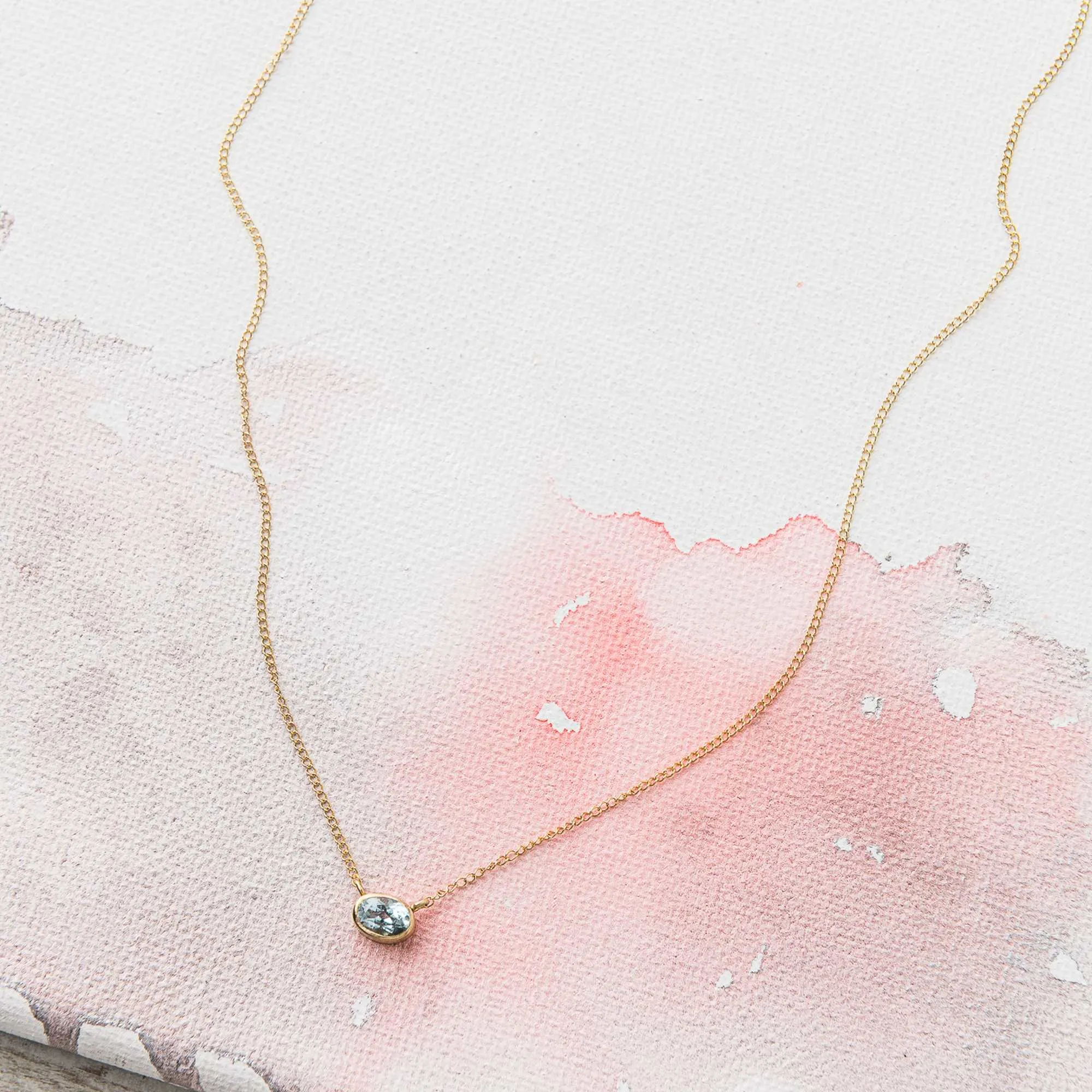 East-West Sky Blue Topaz Necklace in 14k gold